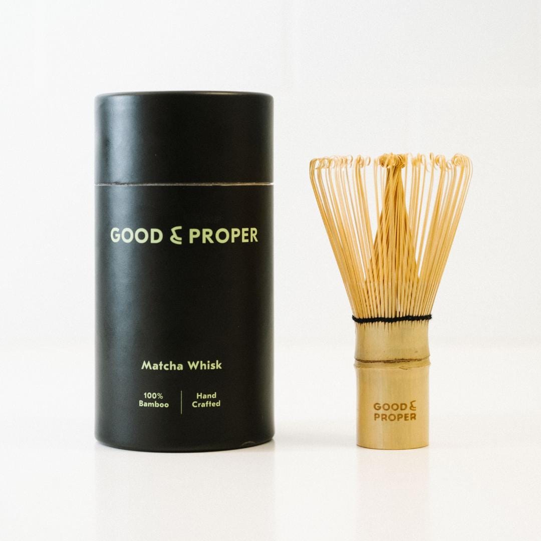 Good & Proper matcha whisk with black cardboard tube on a white background