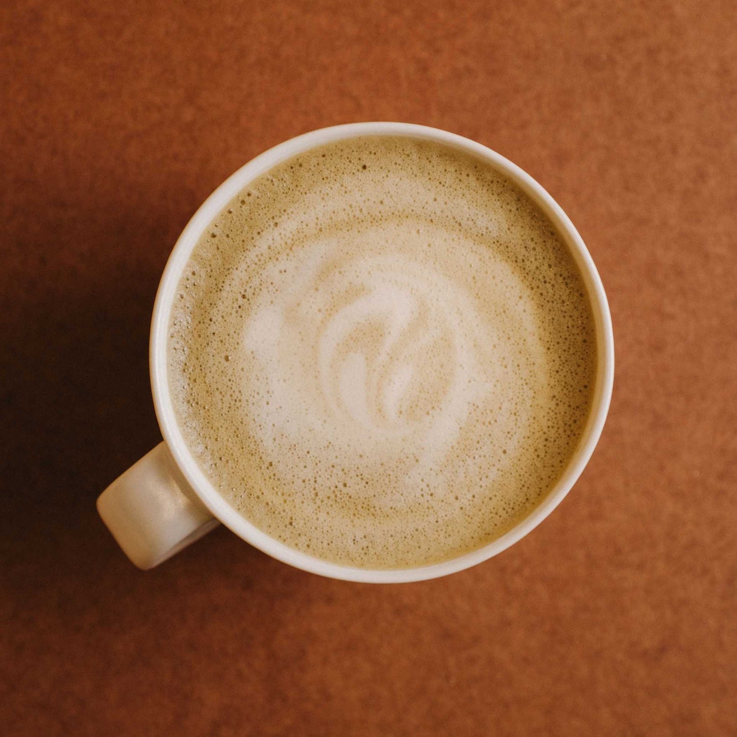 Hojicha latte made using hojicha powder, whisked into a smooth texture using a matcha whisk, then adding milk of your choice.